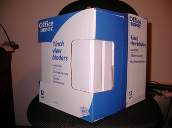 Twelve pack of three ring binders